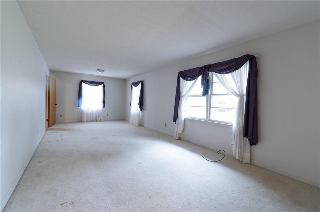 6533 Monnett Road Climax, NC 27233 - Photo 5 of 13 a view of an empty room with a window