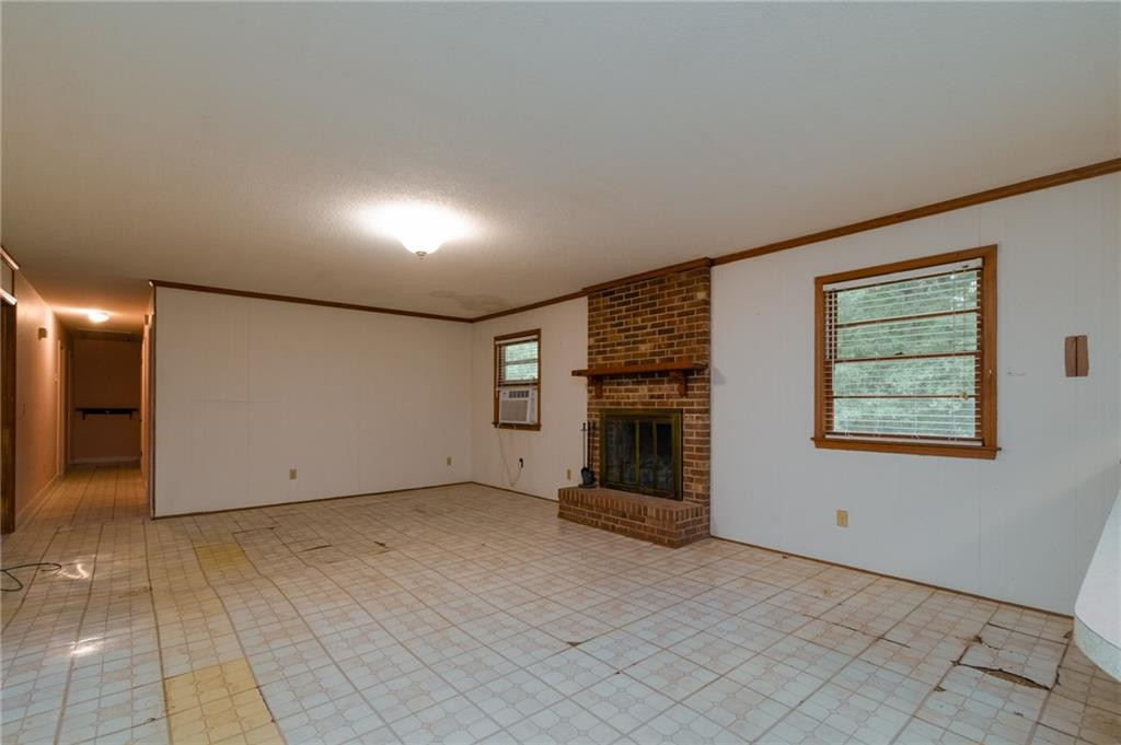 6533 Monnett Road Climax, NC 27233 - Photo 7 of 13 an empty room with windows