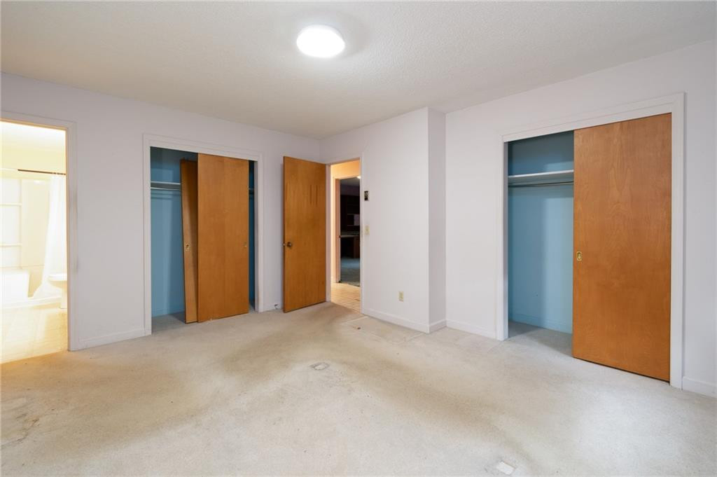 6533 Monnett Road Climax, NC 27233 - Photo 9 of 13 an empty room with closet and windows