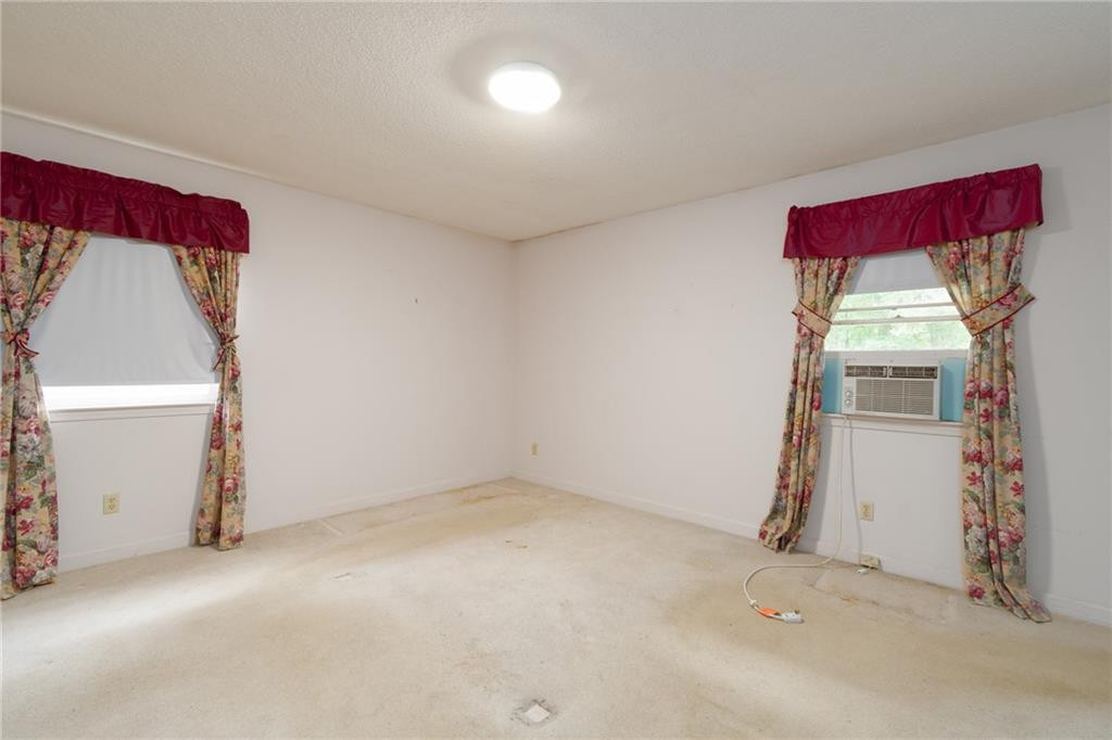 6533 Monnett Road Climax, NC 27233 - Photo 10 of 13 an empty room with windows