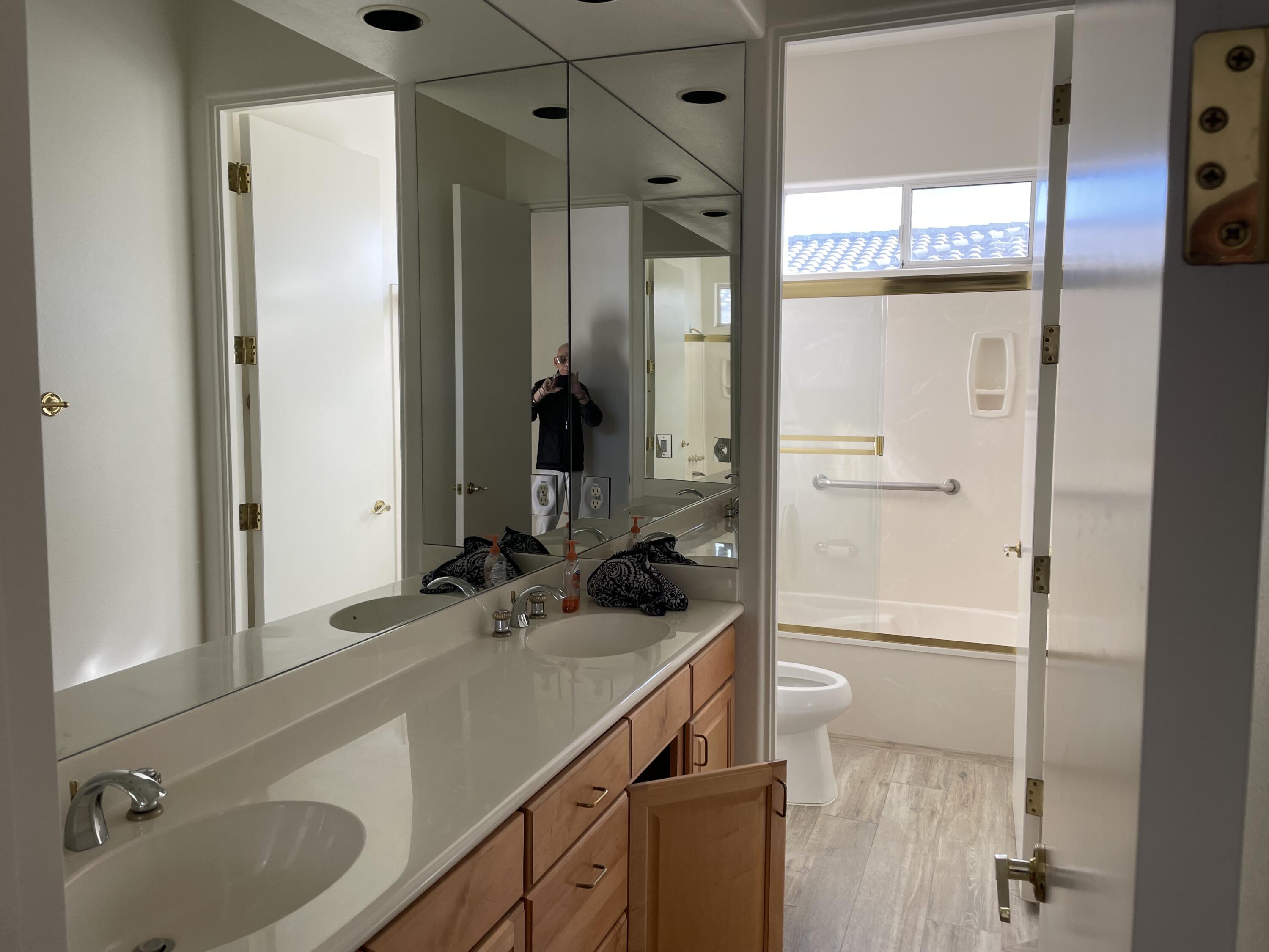 3 King Edward Court Rancho Mirage, CA 92270 - Photo 15 of 20 a bathroom with a sink and a mirror