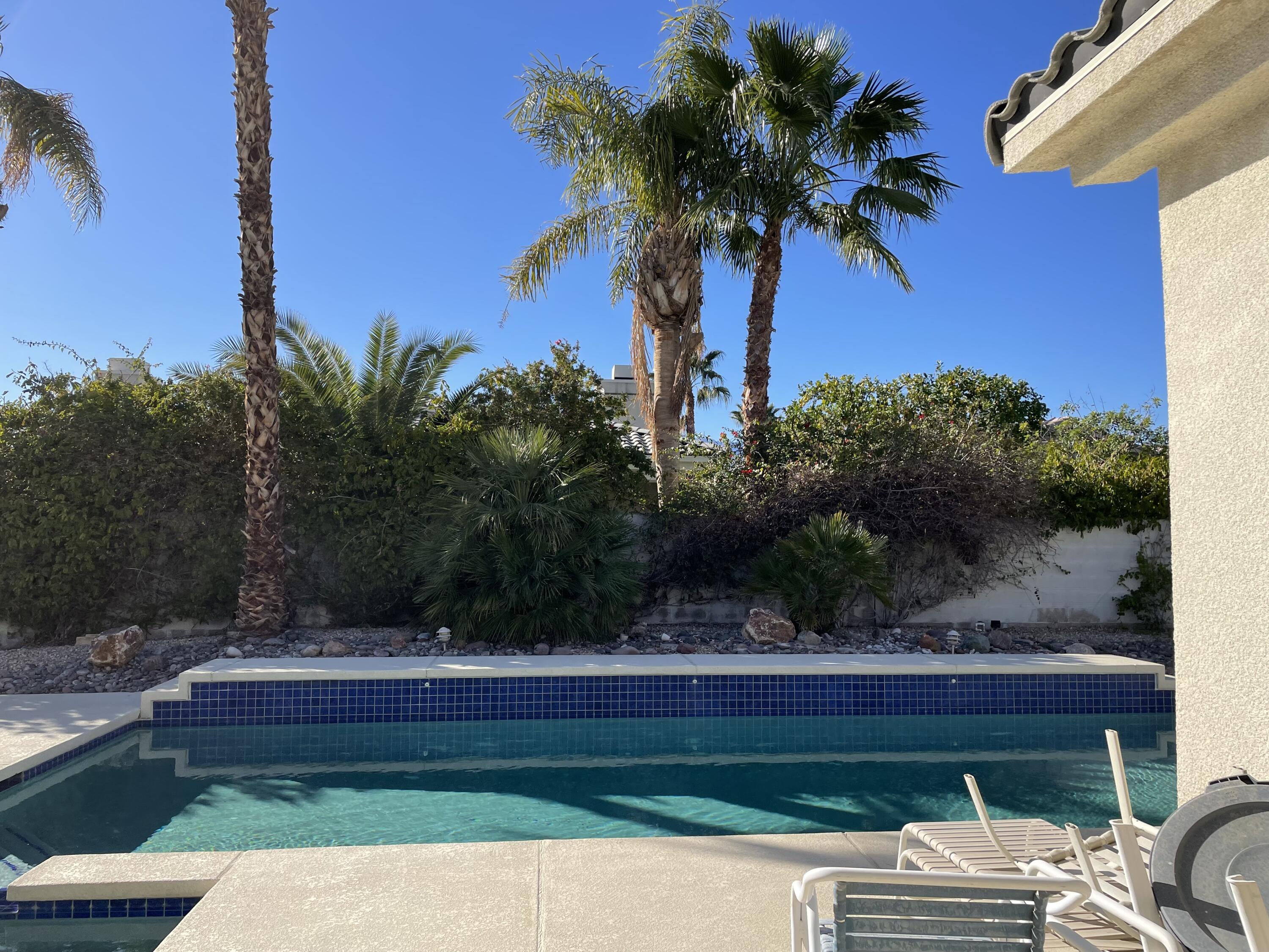 3 King Edward Court Rancho Mirage, CA 92270 - Photo 19 of 20 a view of a yard with plants