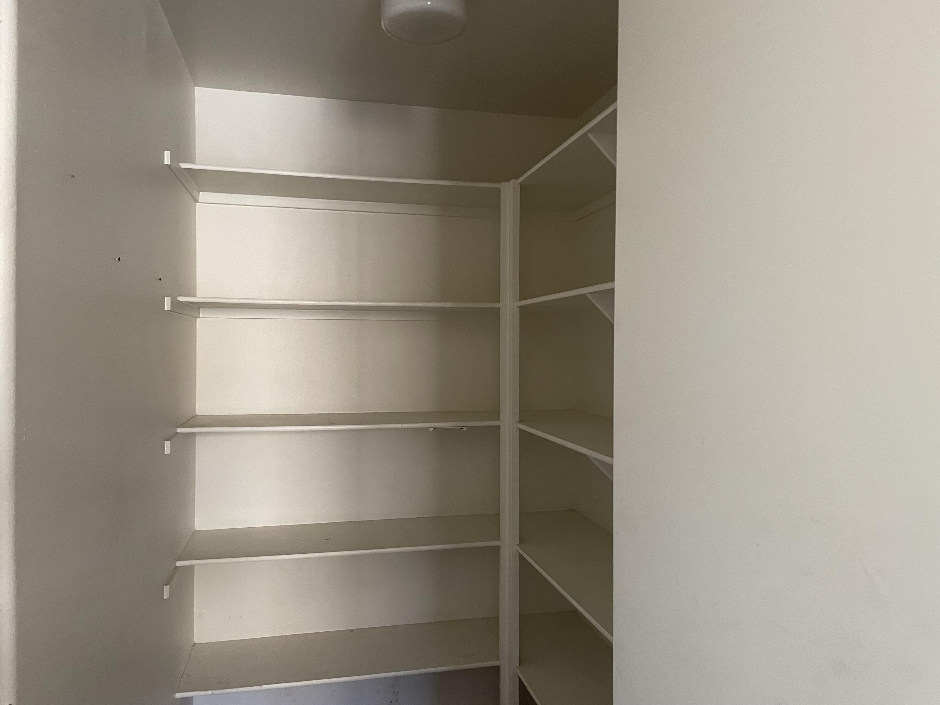 3 King Edward Court Rancho Mirage, CA 92270 - Photo 7 of 20 a view of an empty walk in closet