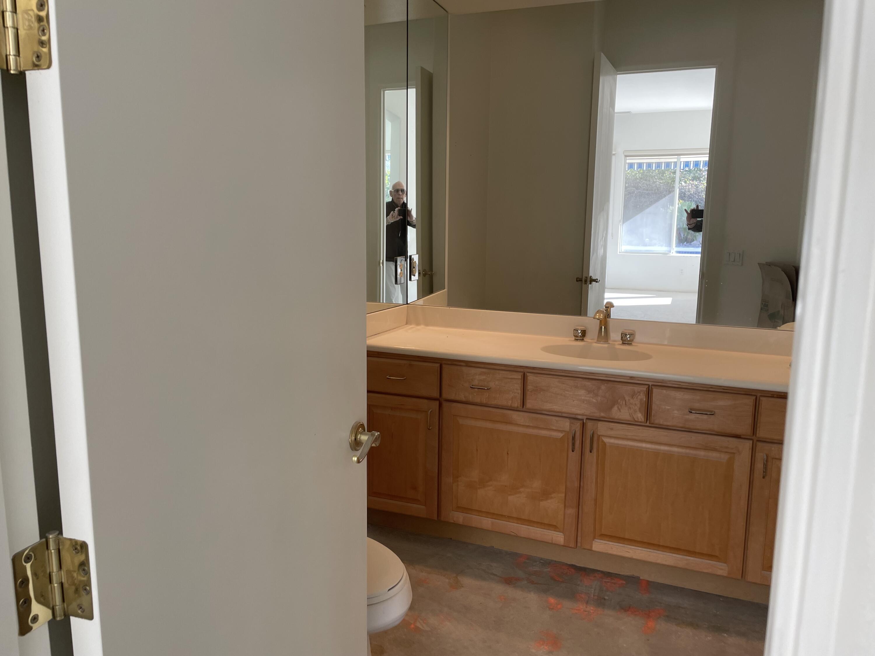 3 King Edward Court Rancho Mirage, CA 92270 - Photo 8 of 20 a bathroom with a sink and a toilet