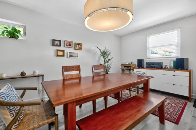 a view of a dining room with furniture