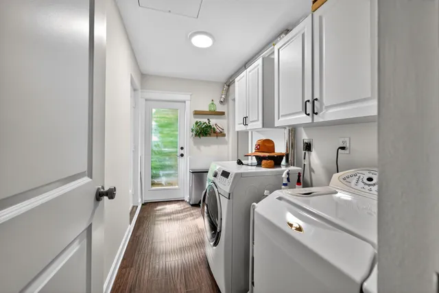 a view of storage and utility room with washer and dryer