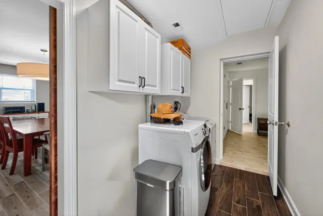 a view of living room with furniture and flat screen tv