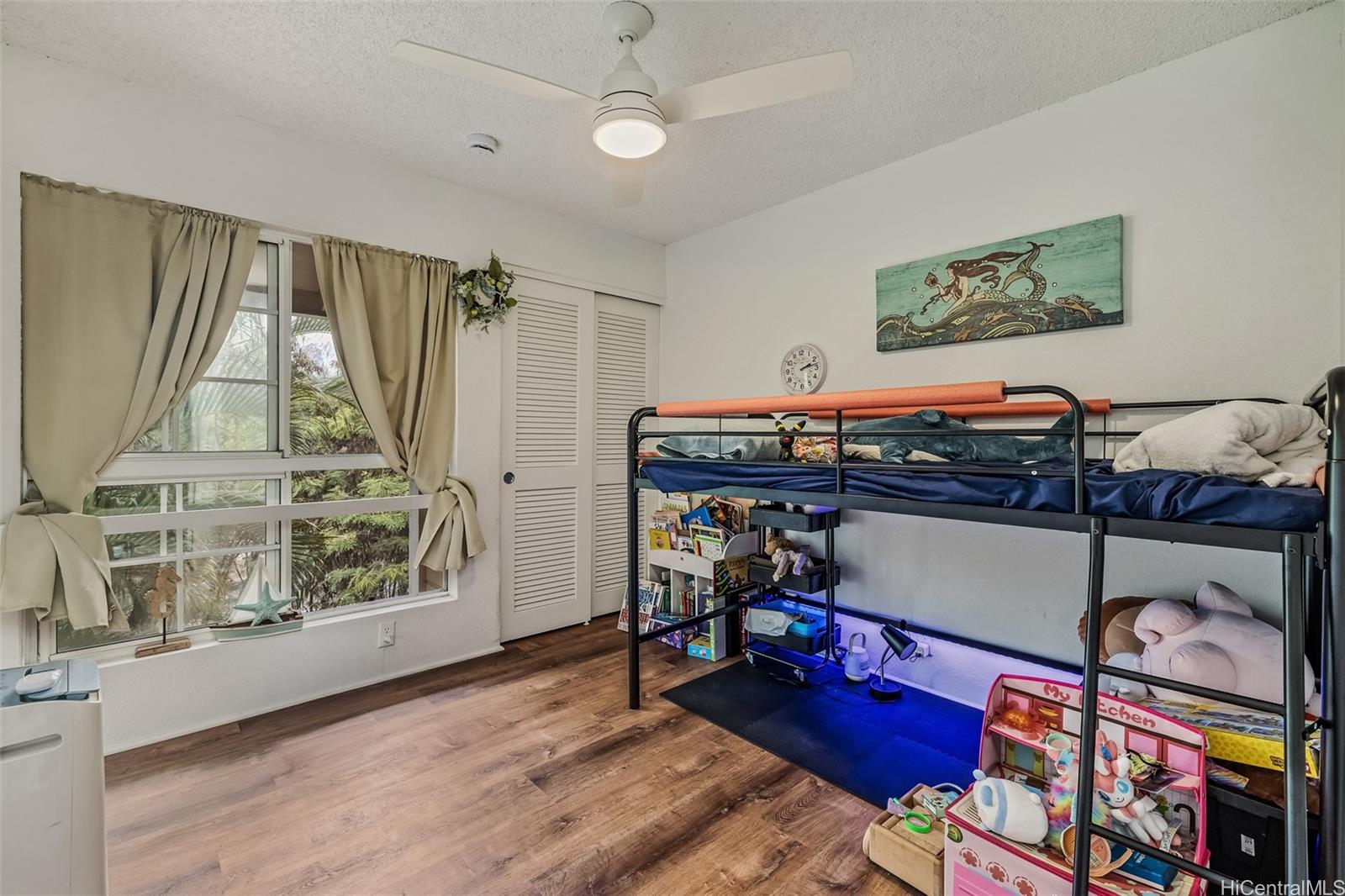 509 Mananai Place, Unit 33T Honolulu, HI 96818 - Photo 10 of 22 a view of a workspace with furniture and a window