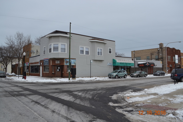 13257 South Baltimore Avenue Chicago, IL 60633 - Photo 1 of 9 a front view of a building with street