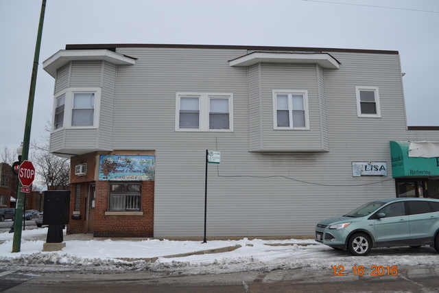 13257 South Baltimore Avenue Chicago, IL 60633 - Photo 2 of 9 a view of a car parked front of a house
