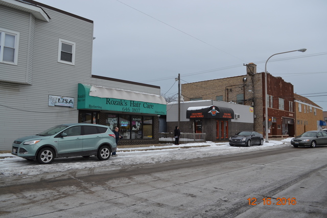 13257 South Baltimore Avenue Chicago, IL 60633 - Photo 3 of 9 a view of a car parked in front of a building
