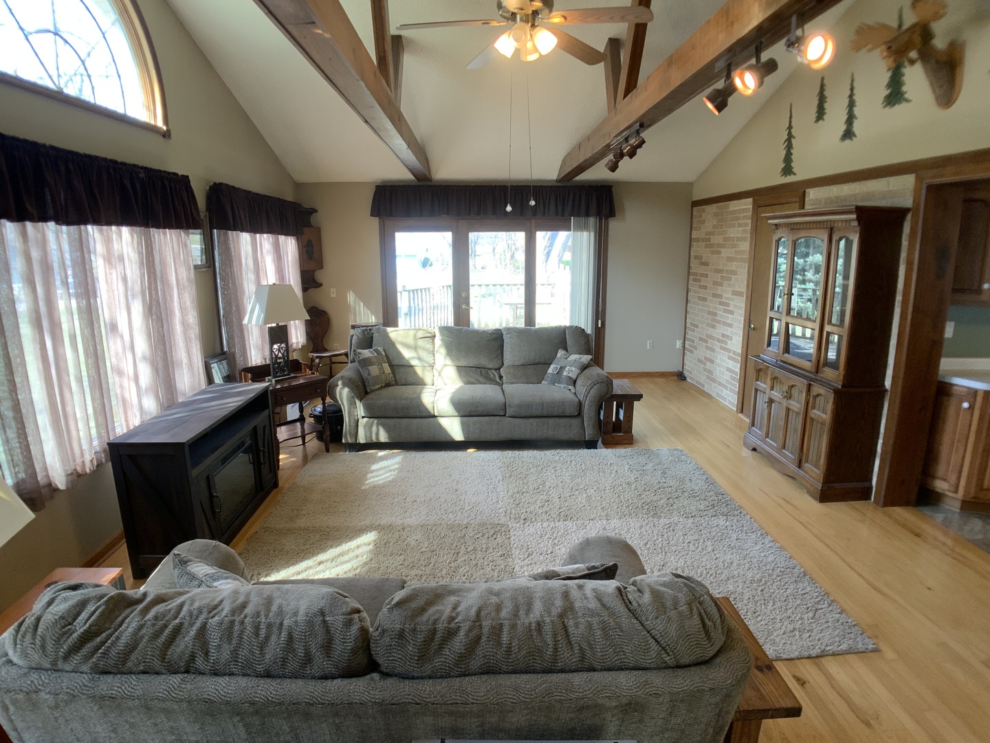 12628 Willow Lane Genoa, IL 60135 - Photo 11 of 21 a living room with furniture and a large window