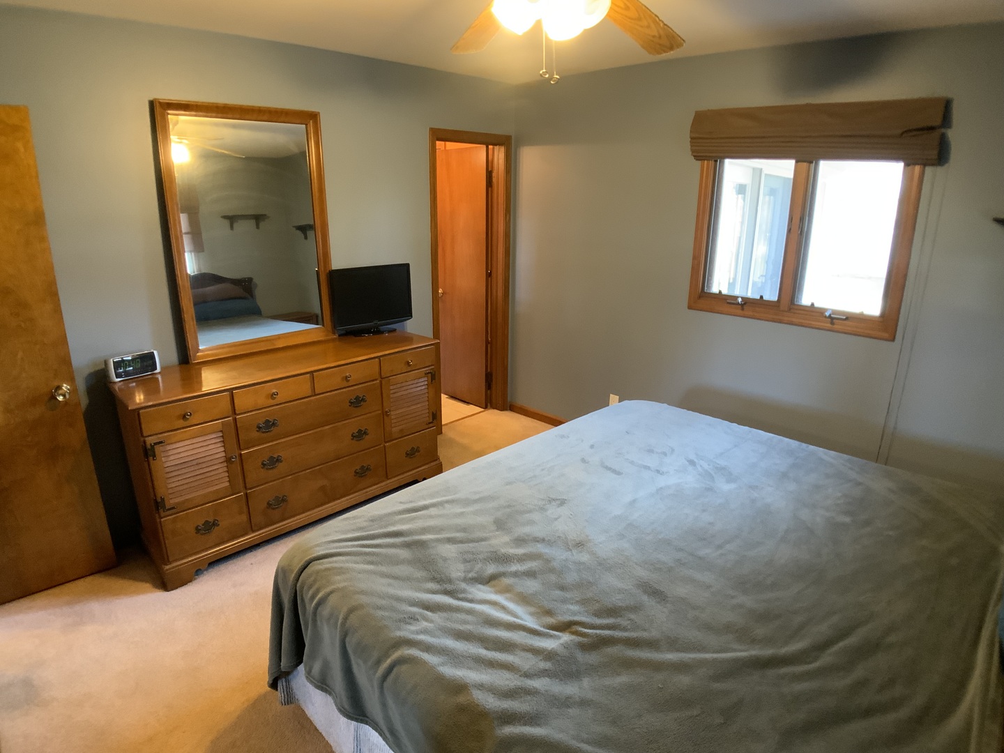 12628 Willow Lane Genoa, IL 60135 - Photo 17 of 21 a bedroom with a bed and a dresser