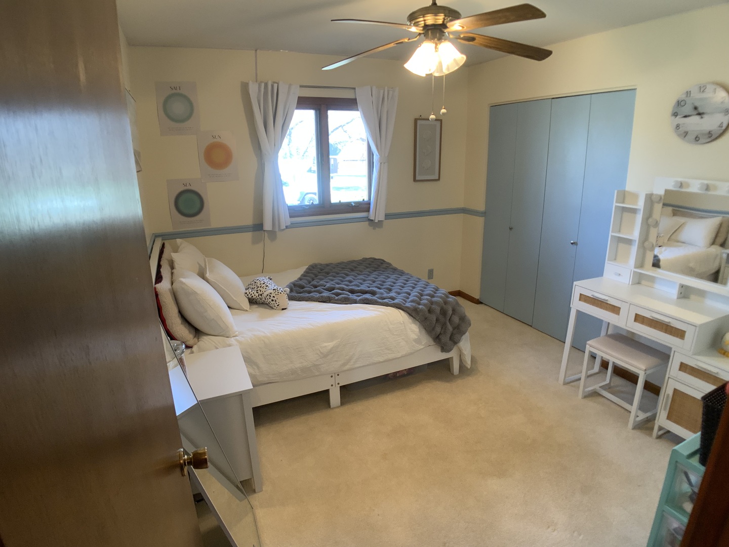 12628 Willow Lane Genoa, IL 60135 - Photo 20 of 21 a bedroom with a bed and a chandelier