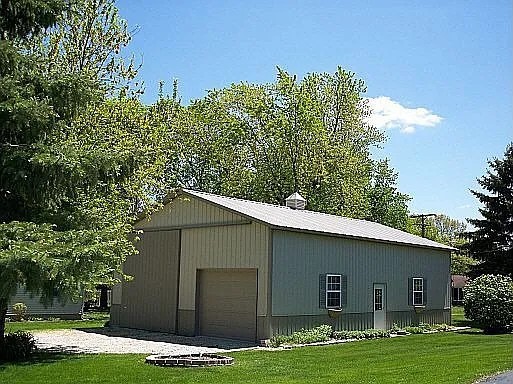 12628 Willow Lane Genoa, IL 60135 - Photo 21 of 21 a front view of a house with a yard