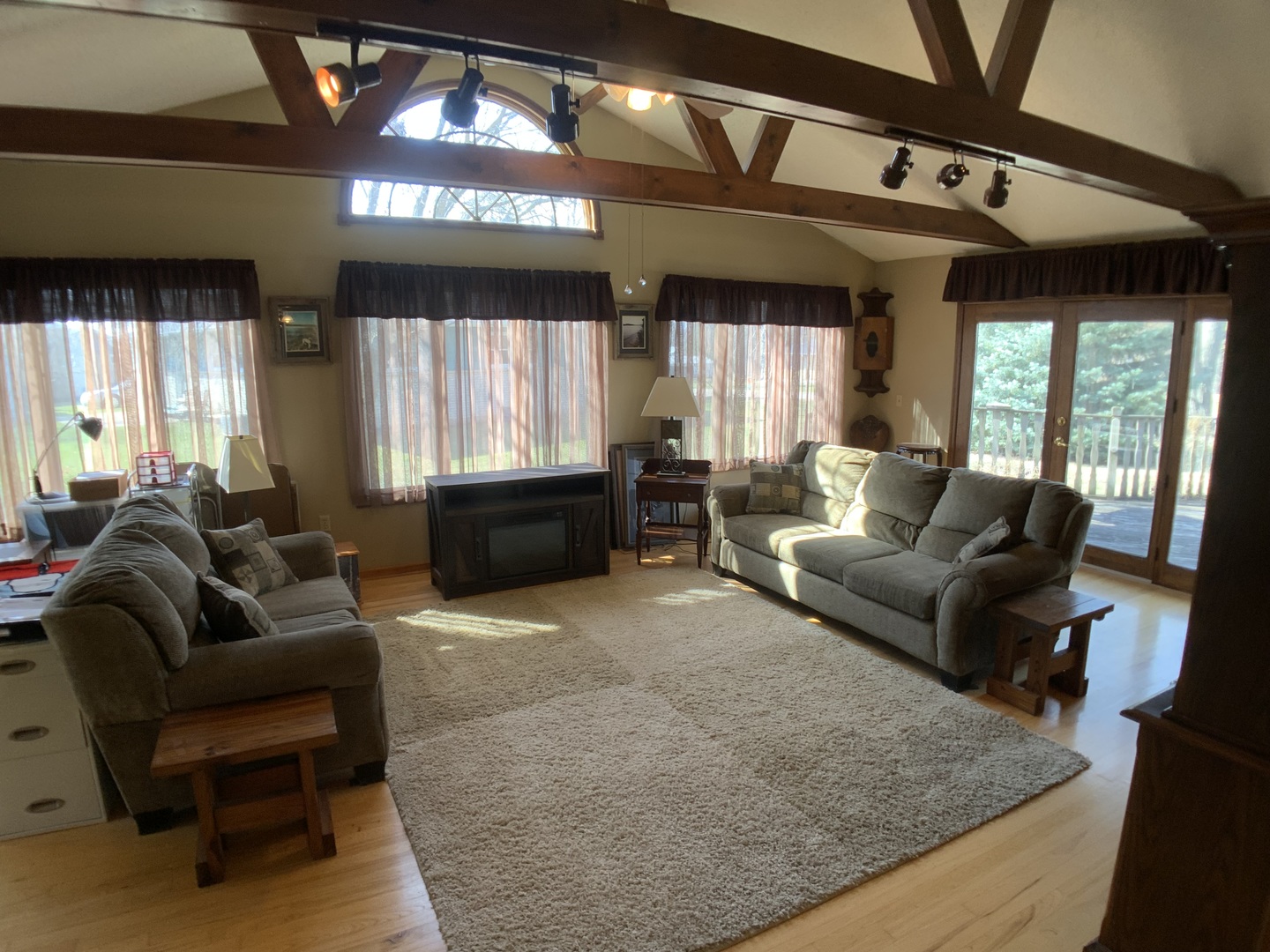 12628 Willow Lane Genoa, IL 60135 - Photo 9 of 21 a living room with furniture and a large window