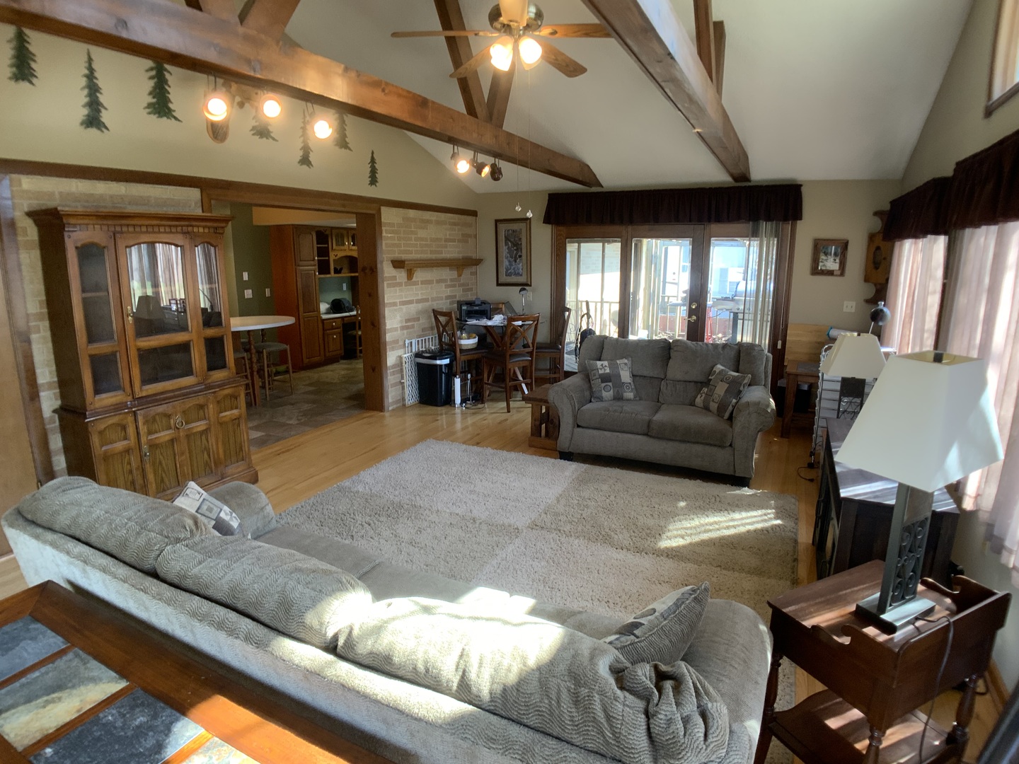 12628 Willow Lane Genoa, IL 60135 - Photo 10 of 21 a living room with furniture and a large window