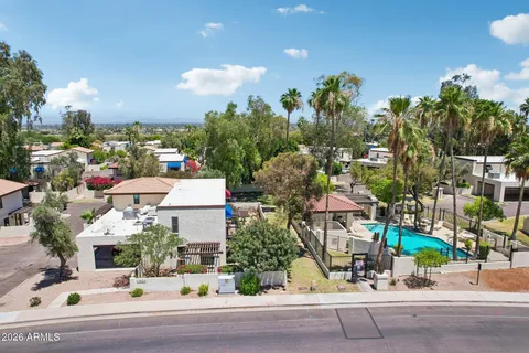 a view of a backyard with a garden