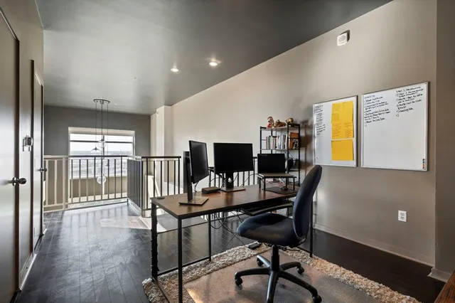 a workspace with furniture and window