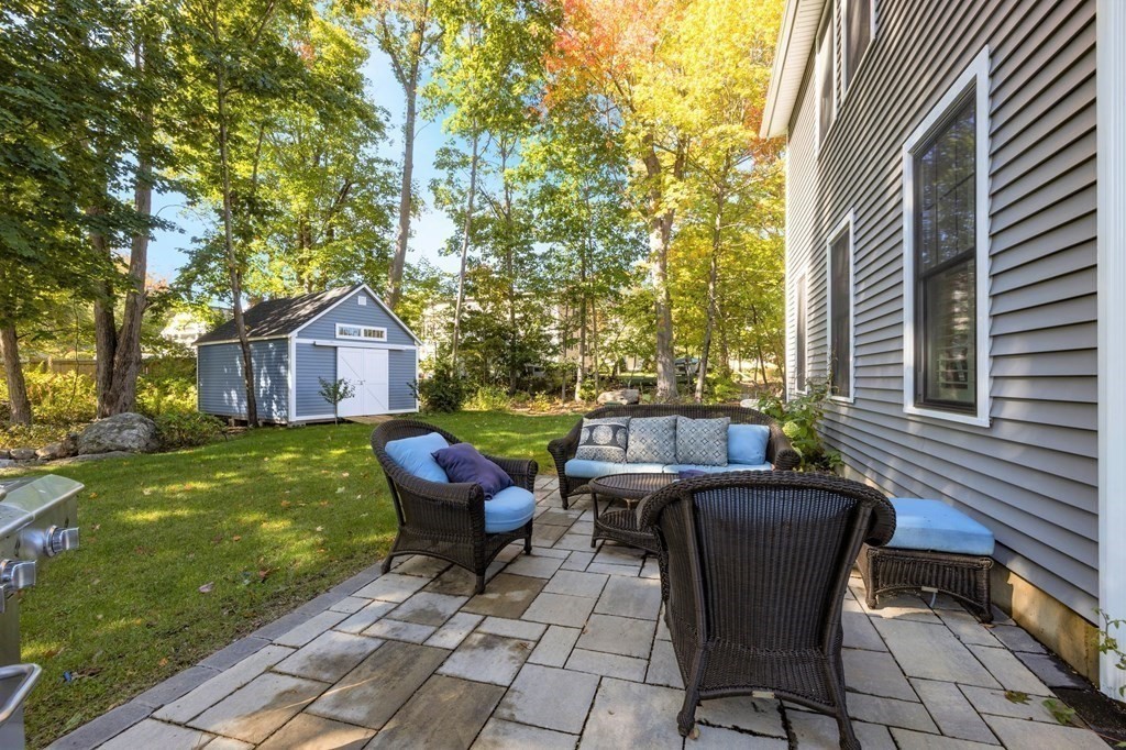 12 Big Rock Road Rye, NH 03870 - Photo 33 of 42 a view of house with backyard and outdoor seating