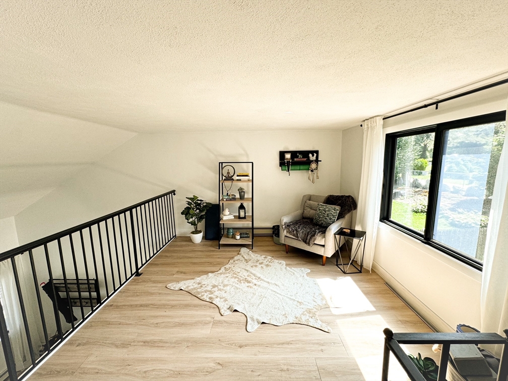 101 Spiers Road Newton, MA 02459 - Photo 14 of 35 a bedroom with furniture and a large window