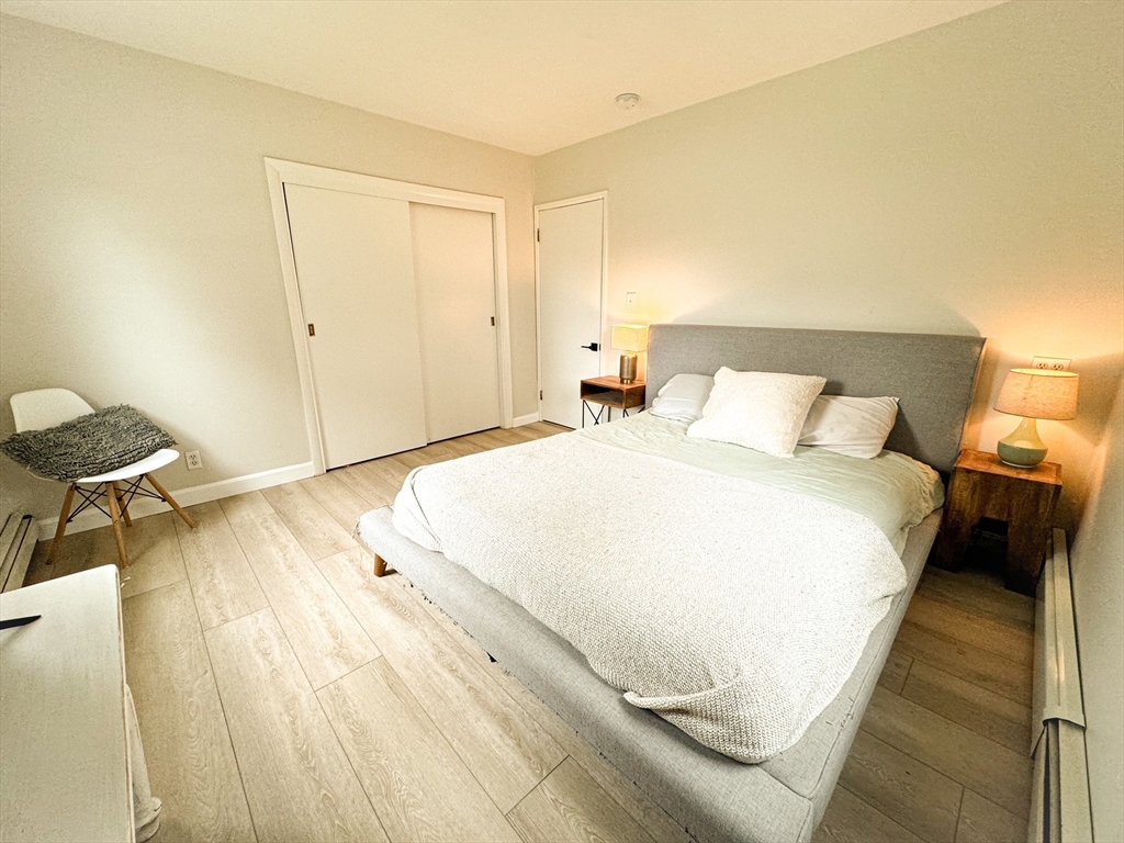 101 Spiers Road Newton, MA 02459 - Photo 26 of 35 a bedroom with a bed and a table