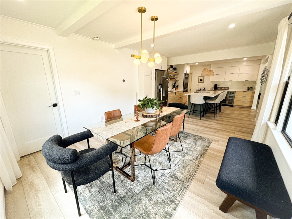 101 Spiers Road Newton, MA 02459 - Photo 9 of 35 a dining room with furniture and wooden floor