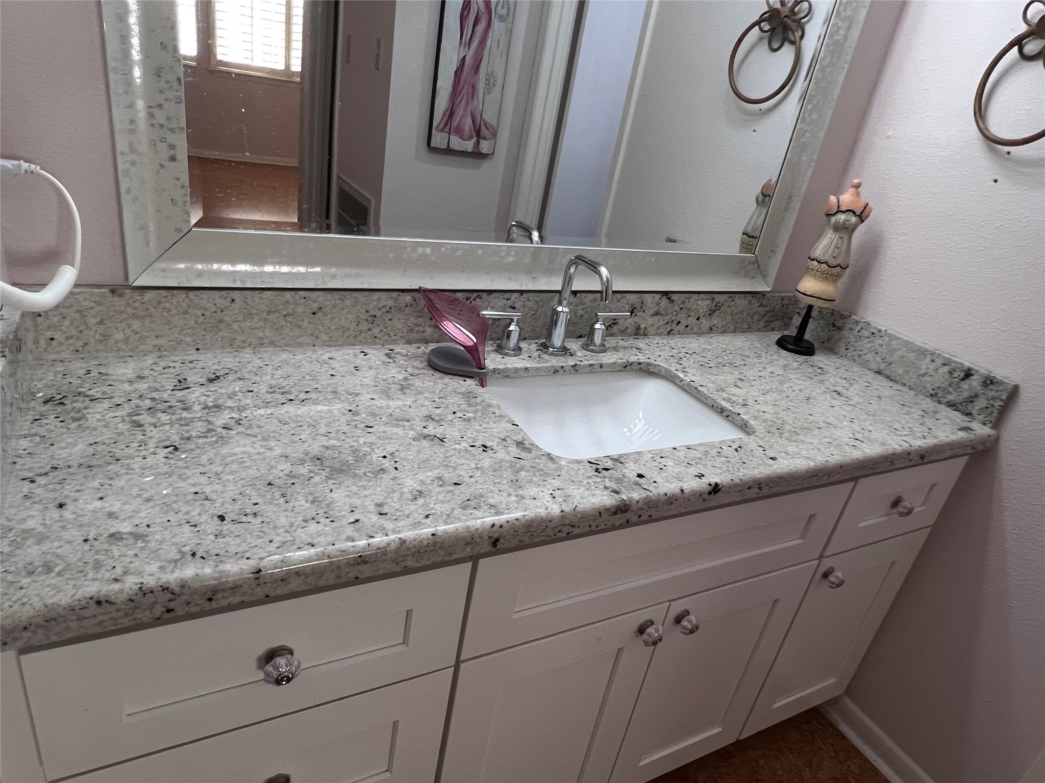 2100 Commonwealth Street, Unit L Houston, TX 77006 - Photo 21 of 30 a bathroom with a granite countertop sink and a mirror