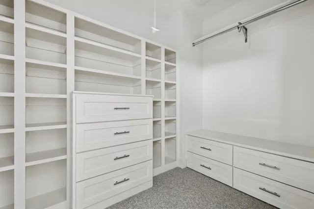 a view of an empty walk in closet