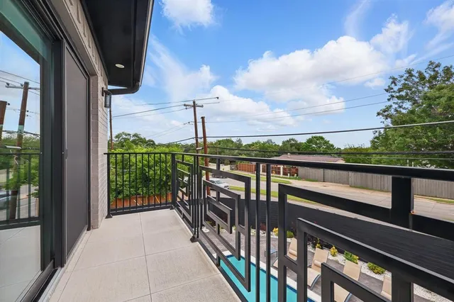 a view of city from a balcony