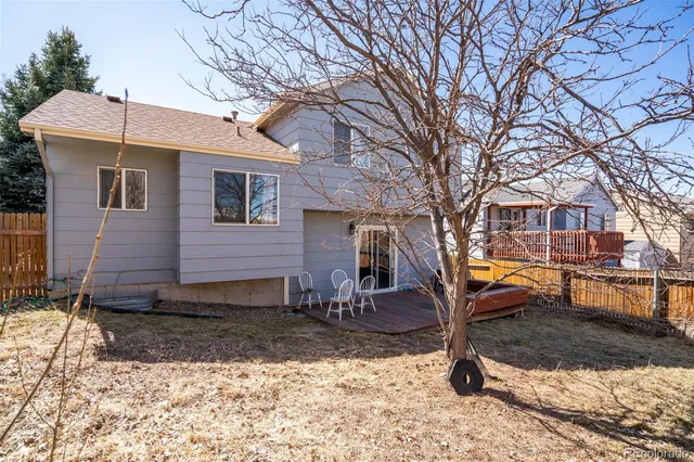 a view of a balcony with furniture