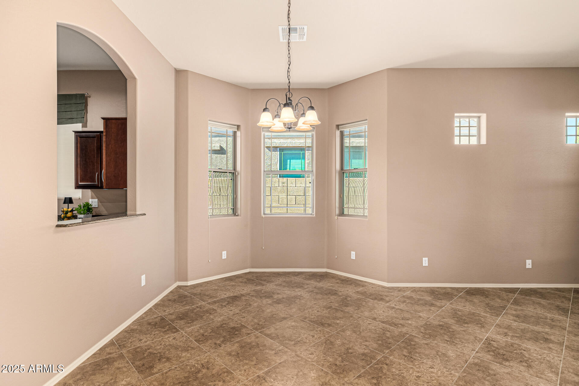 6202 East McKellips Road, Unit 156 Mesa, AZ 85215 - Photo 17 of 57 a view of a room with window and hallway