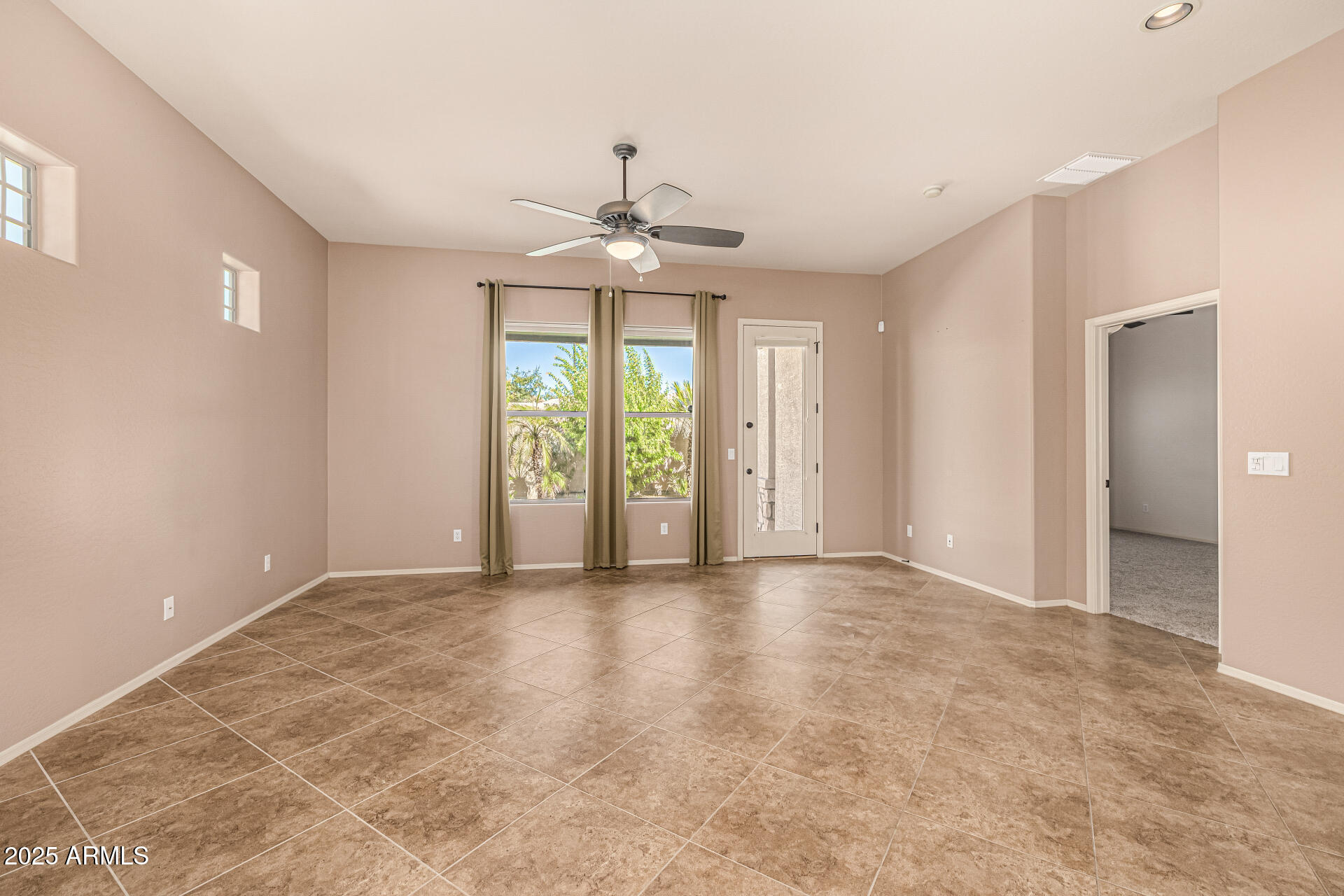 6202 East McKellips Road, Unit 156 Mesa, AZ 85215 - Photo 21 of 57 wooden floor in an empty room with a window