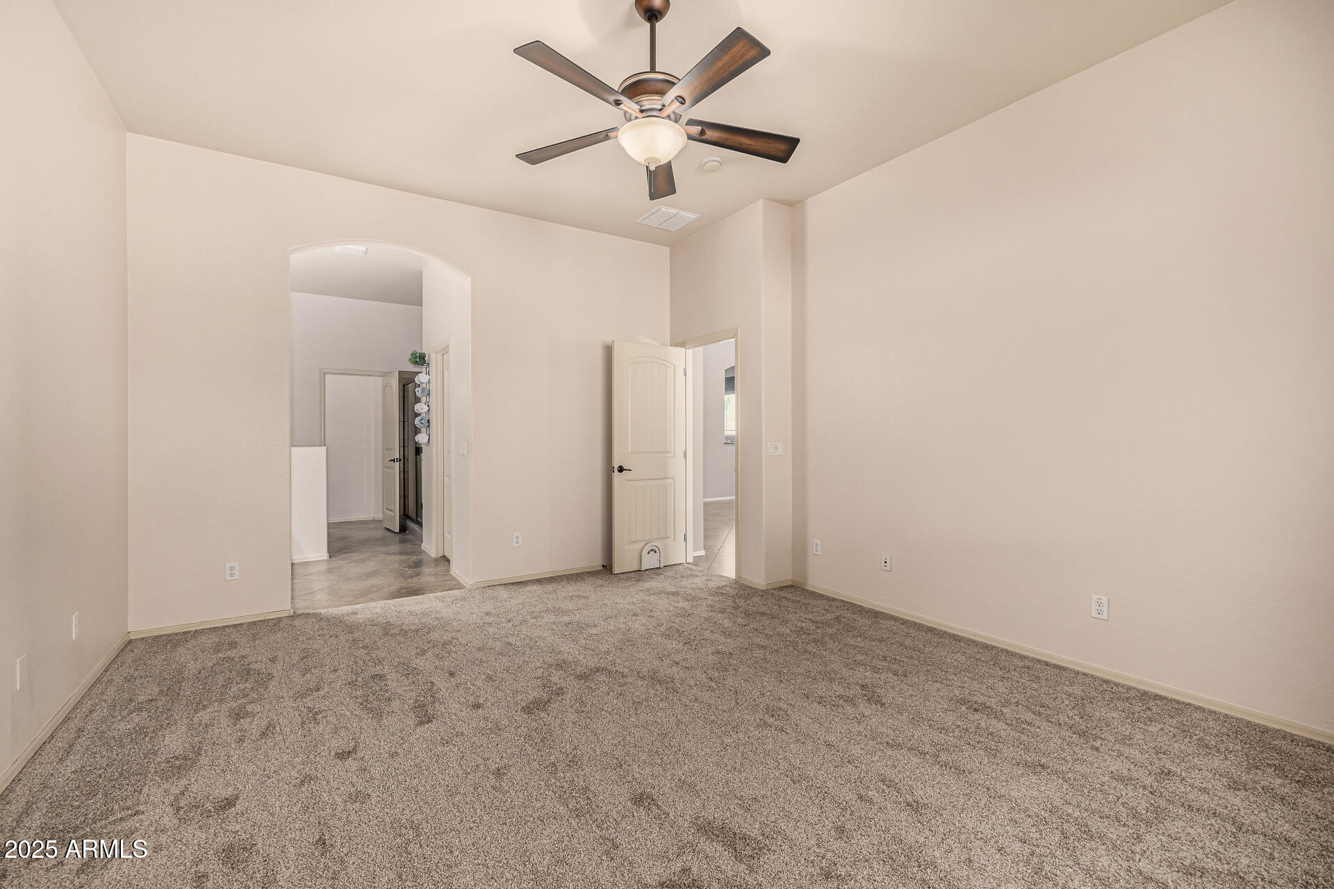 6202 East McKellips Road, Unit 156 Mesa, AZ 85215 - Photo 28 of 57 a view of a livingroom with a ceiling fan and window