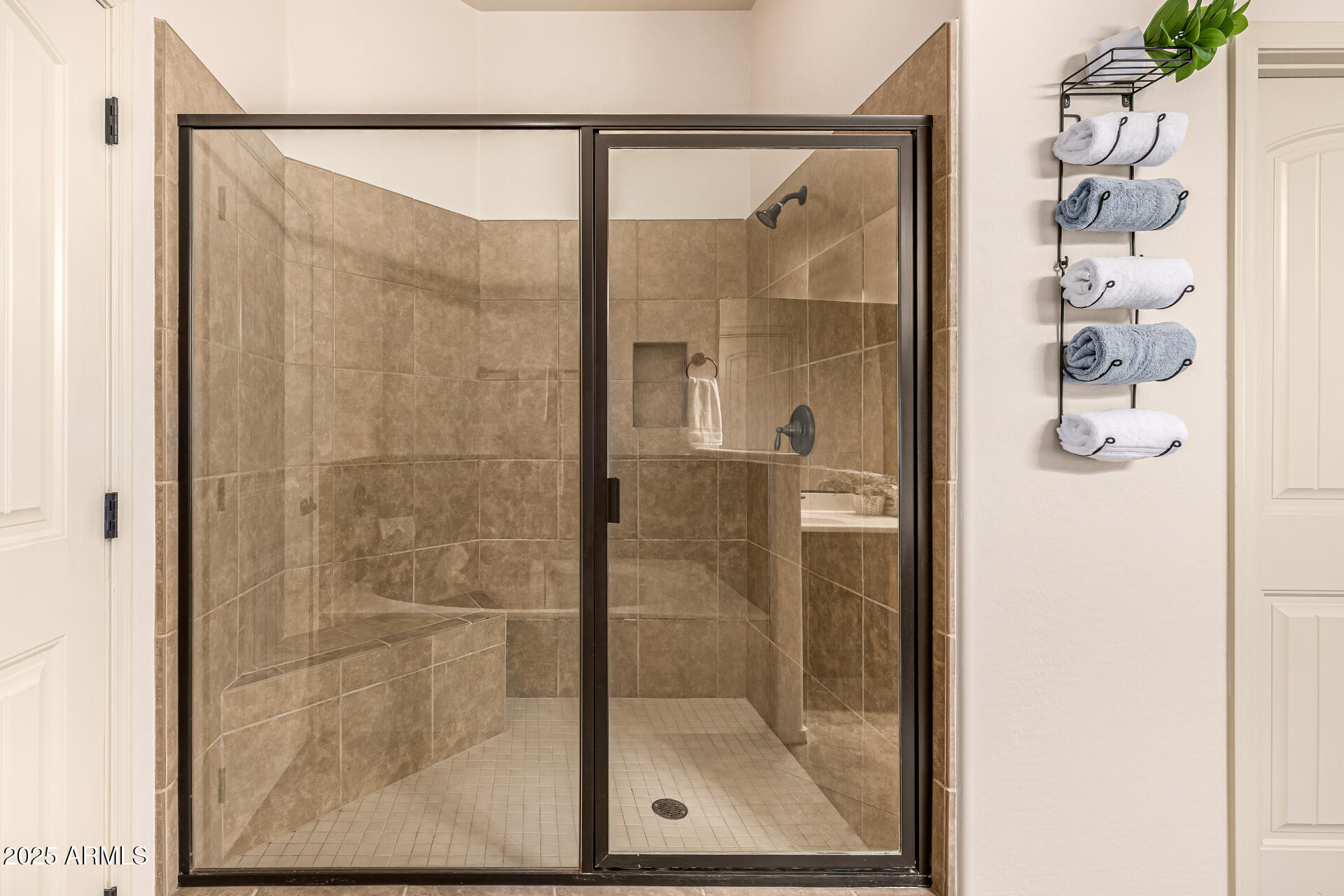 6202 East McKellips Road, Unit 156 Mesa, AZ 85215 - Photo 33 of 57 a bathroom with a glass shower door