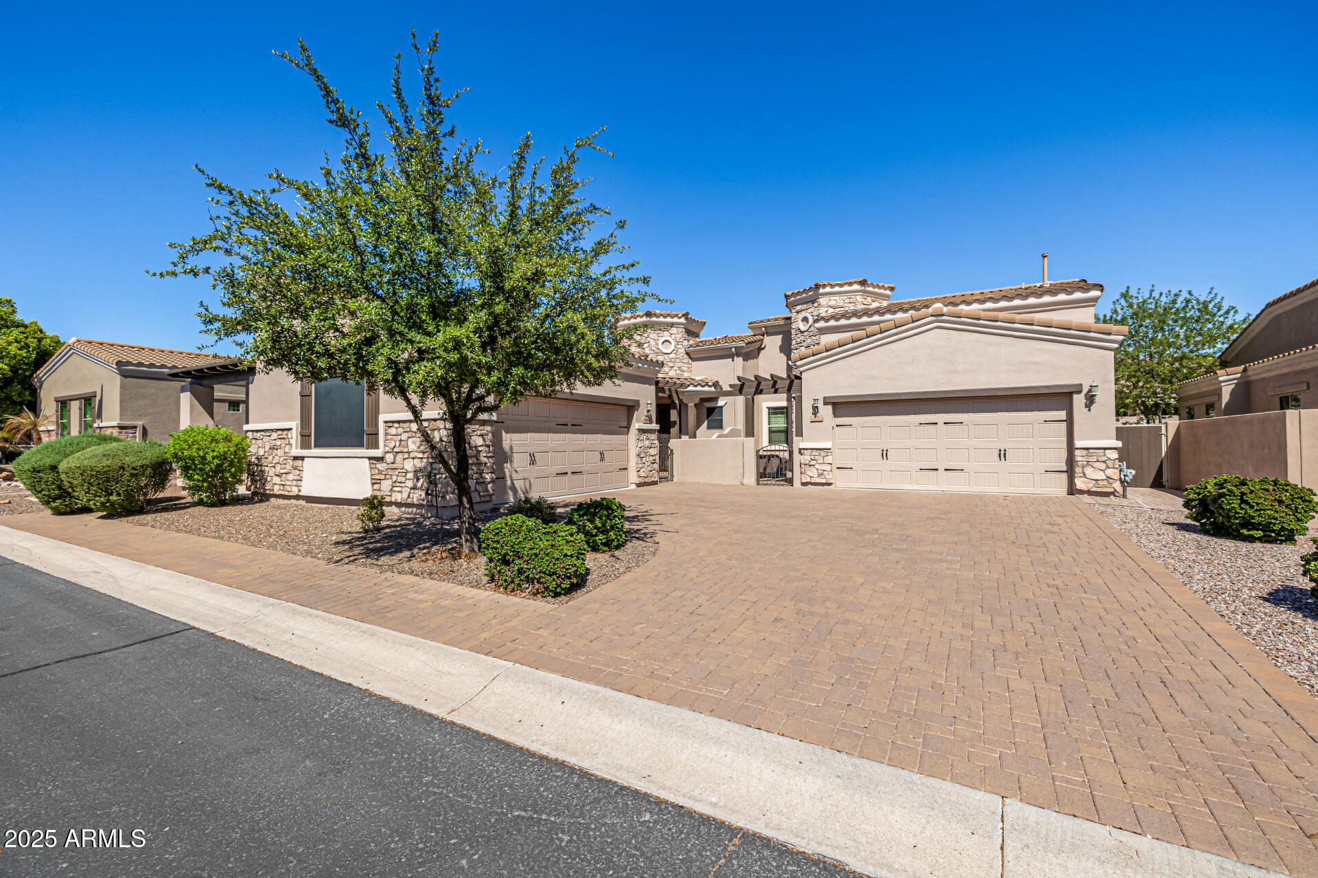 6202 East McKellips Road, Unit 156 Mesa, AZ 85215 - Photo 5 of 57 front view of a house with a street