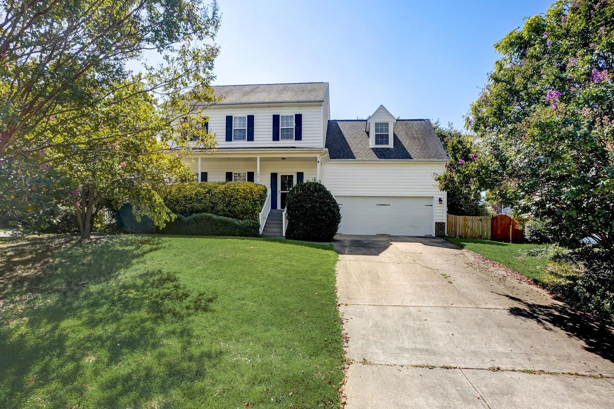 4816 Elmhurst Ridge Court Raleigh, NC 27616 - Photo 1 of 27 a house view with a garden space