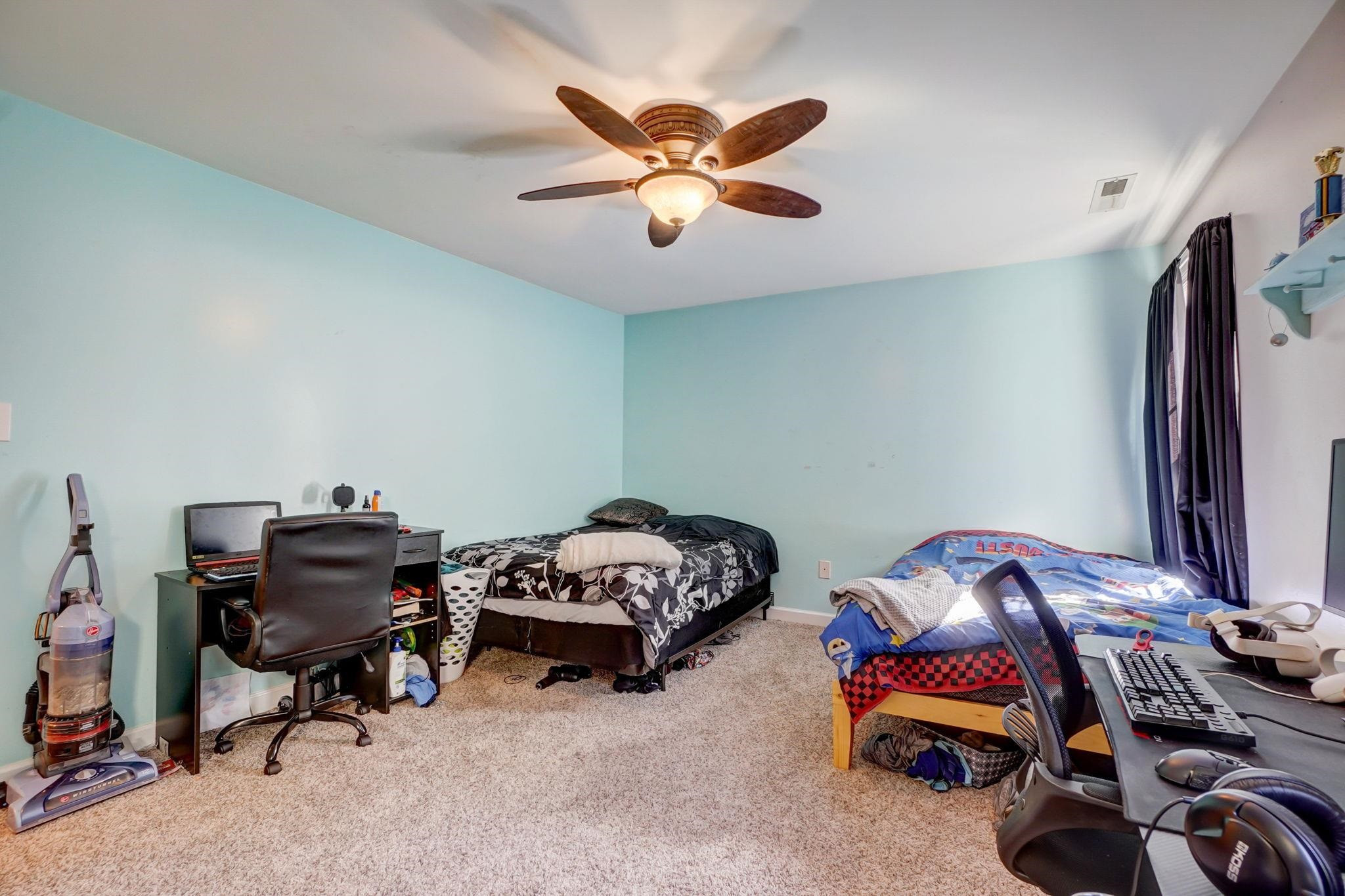 4816 Elmhurst Ridge Court Raleigh, NC 27616 - Photo 15 of 27 a view of a workspace with furniture