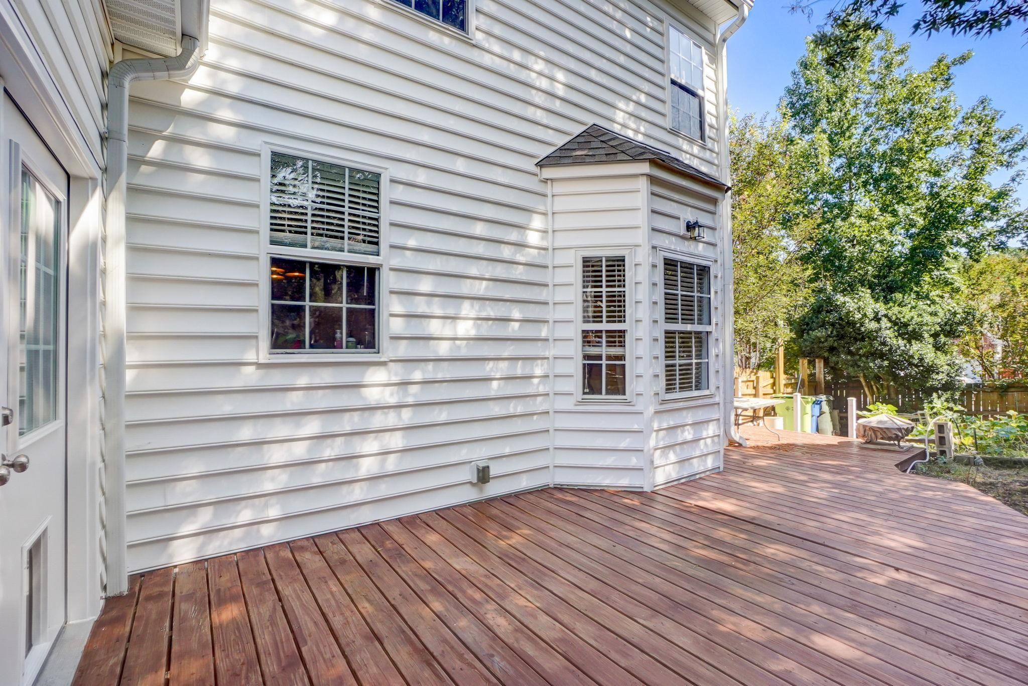4816 Elmhurst Ridge Court Raleigh, NC 27616 - Photo 23 of 27 a view of a house with a roof deck
