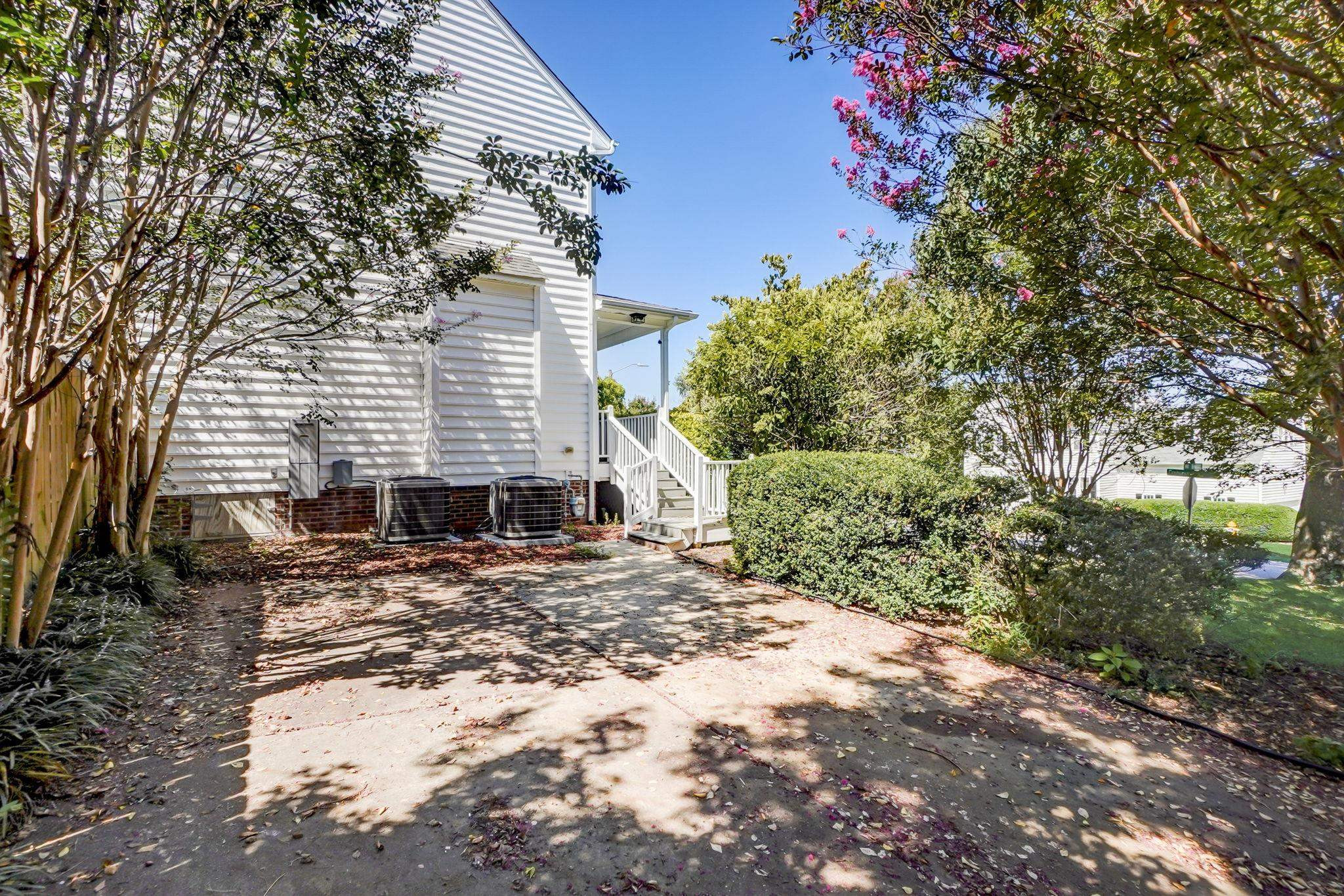 4816 Elmhurst Ridge Court Raleigh, NC 27616 - Photo 25 of 27 a view of a house with a tree