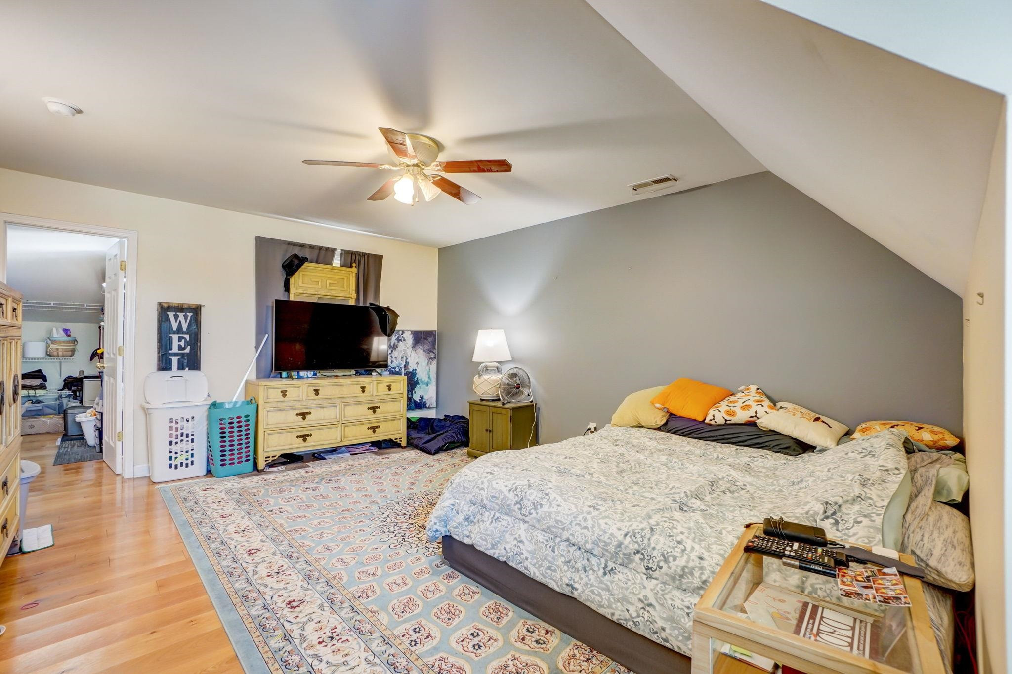 4816 Elmhurst Ridge Court Raleigh, NC 27616 - Photo 10 of 27 a bedroom with two beds and a flat screen tv