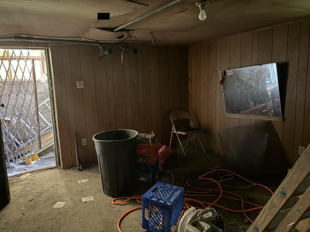 304 Polk Street Gary, IN 46402 - Photo 21 of 26 a living room with furniture and a window