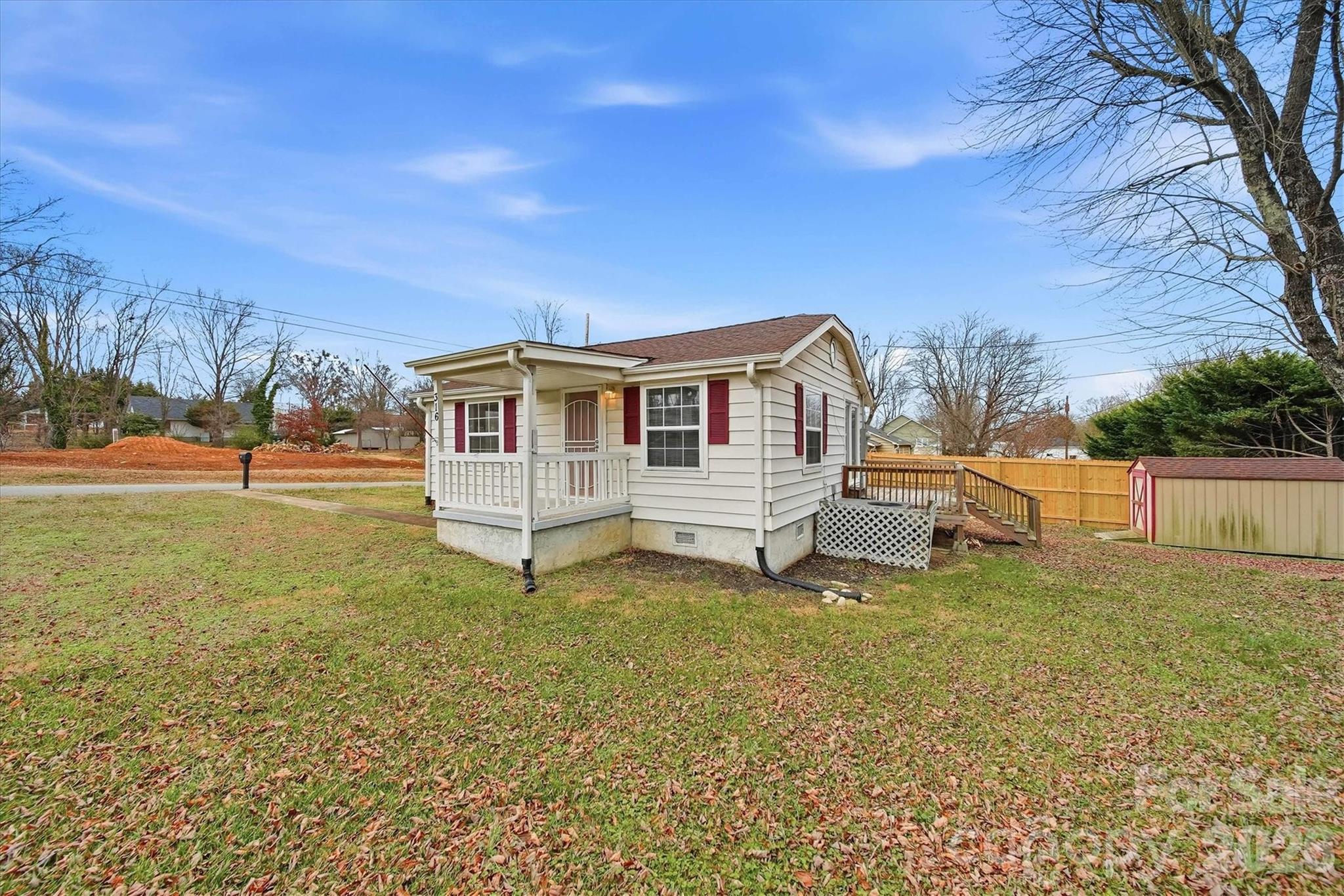 316 23rd Street Northwest Hickory, NC 28601 - Photo 2 of 15 a view of a house with a yard and sitting area