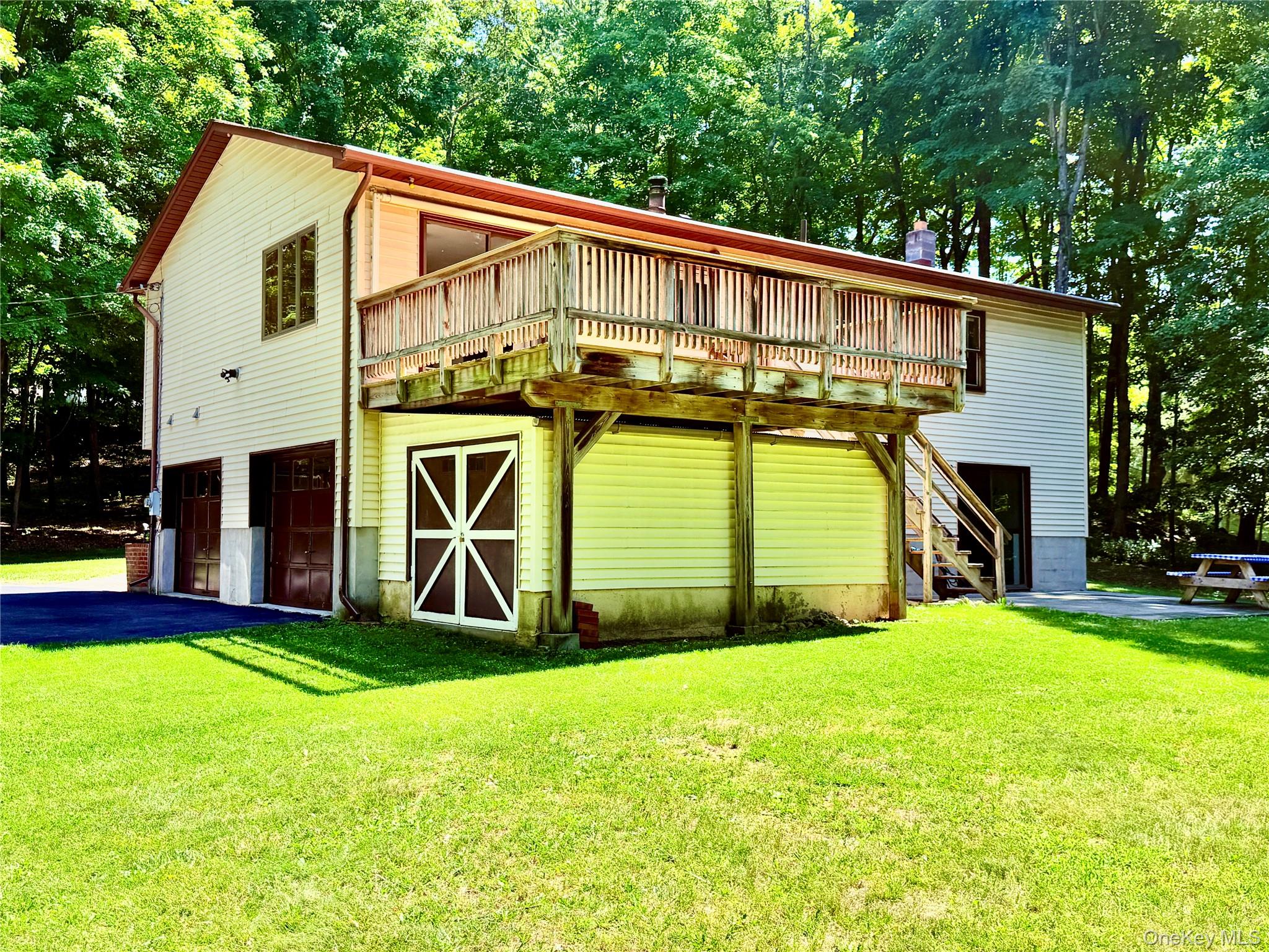 126 Carter Road Pleasant Valley, NY 12569 - Photo 29 of 32 with side view of the 2 car garage