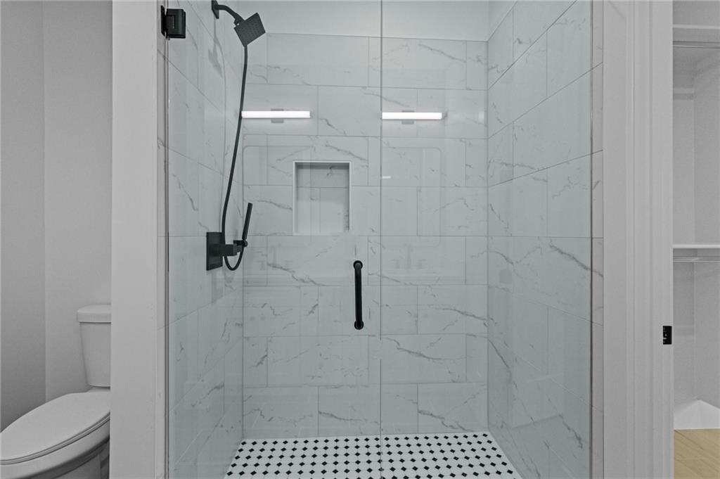 2865 Old Fountain Road Dacula, GA 30019 - Photo 27 of 84 a bathroom with a shower