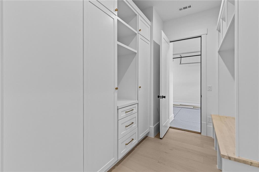 2865 Old Fountain Road Dacula, GA 30019 - Photo 48 of 84 a view of an empty walk in closet