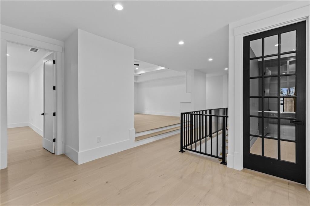 2865 Old Fountain Road Dacula, GA 30019 - Photo 50 of 84 a view of a hallway with windows