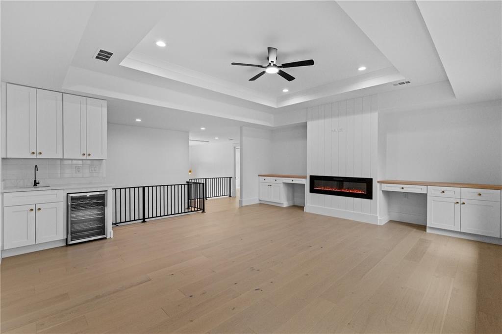 2865 Old Fountain Road Dacula, GA 30019 - Photo 52 of 84 a view of a kitchen with a sink and dishwasher cabinets