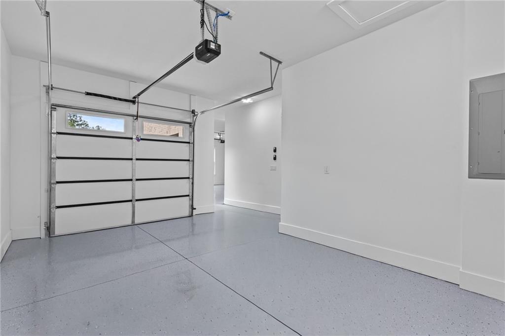 2865 Old Fountain Road Dacula, GA 30019 - Photo 75 of 84 a view of a room with racks on the wall