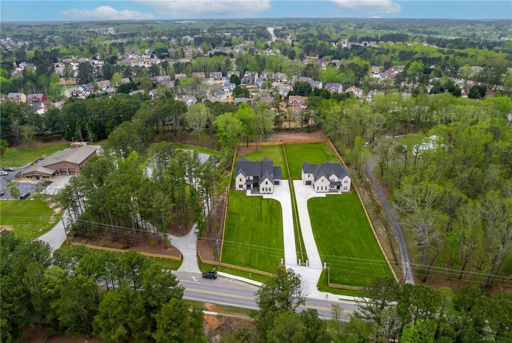 2865 Old Fountain Road Dacula, GA 30019 - Photo 8 of 84 an aerial view of tennis court